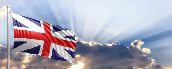De vlag van Groot-Brittannië op blauwe hemel. 3D illustratie — Stockfoto