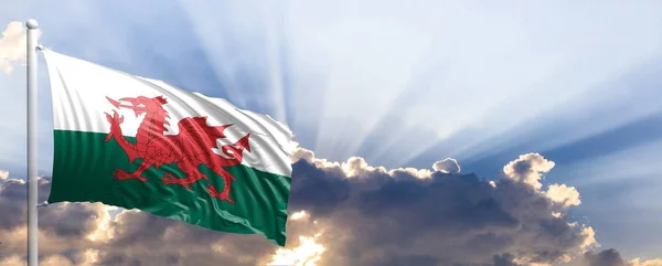 De vlag van Wales op blauwe hemel. 3D illustratie — Stockfoto