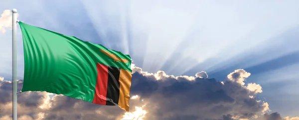 Zambiya bayrağı mavi gökyüzü. 3D çizim — Stok fotoğraf