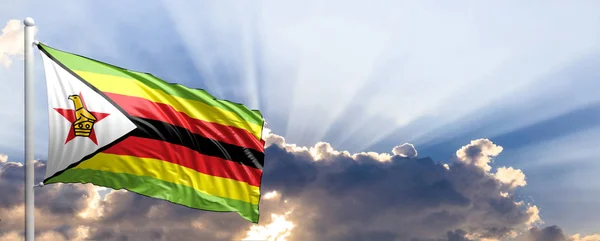 Flaga Zimbabwe na błękitne niebo. ilustracja 3D — Zdjęcie stockowe