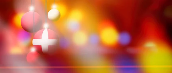 Denmark flag on Christmas ball with blurred and abstract background. — Stock Photo, Image