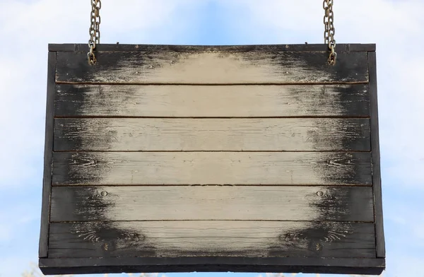 Wooden blank sign hanging with metal chains, copy space — Stock Photo, Image