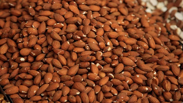 Almonds\'s kernel proper snack for vegan, vegetarian and people on diet. Top view.
