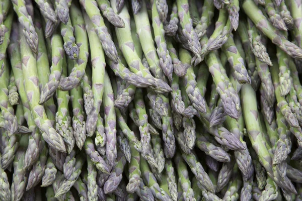 Groene asperges achtergrond — Stockfoto