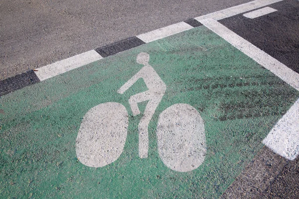 Símbolo de bicicleta sobre fondo verde —  Fotos de Stock