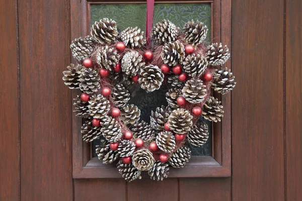 Christmas Cone Decoration on Door — Stock Photo, Image
