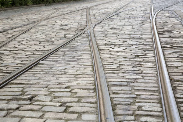 Spårvagnsspåren på Cobble sten Street — Stockfoto