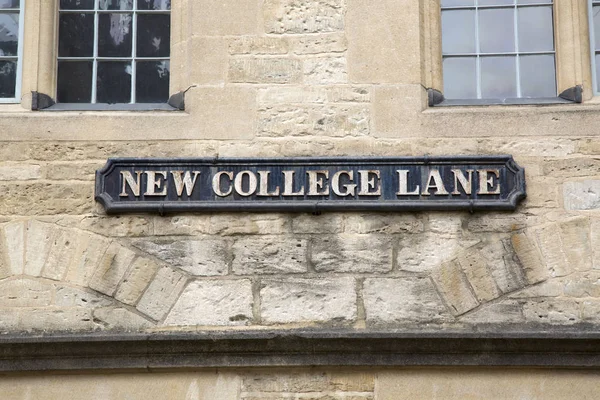 New College Lane Street Sign; Оксфорд; Англия — стоковое фото