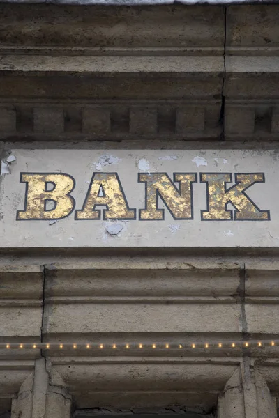 Firma de banco en fachada de piedra —  Fotos de Stock