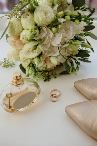 Two Gold Wedding Rings Flowers Stock Photo