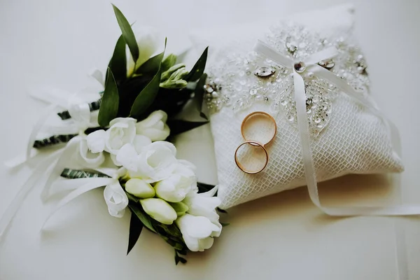 Two Gold Wedding Rings Flowers Stock Picture