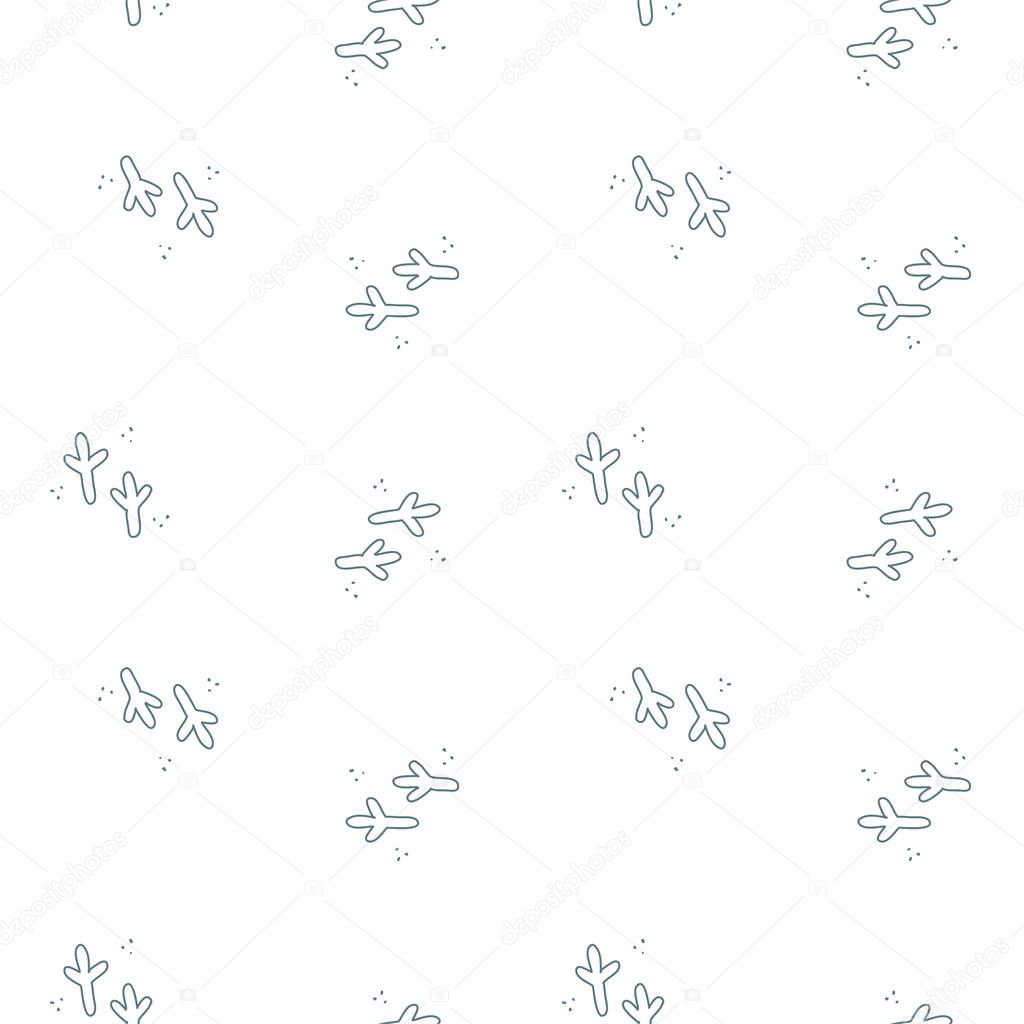 Seamless pattern with bird tracks. Winter monochrome background of doodle bird tracks. Vector 8 EPS.