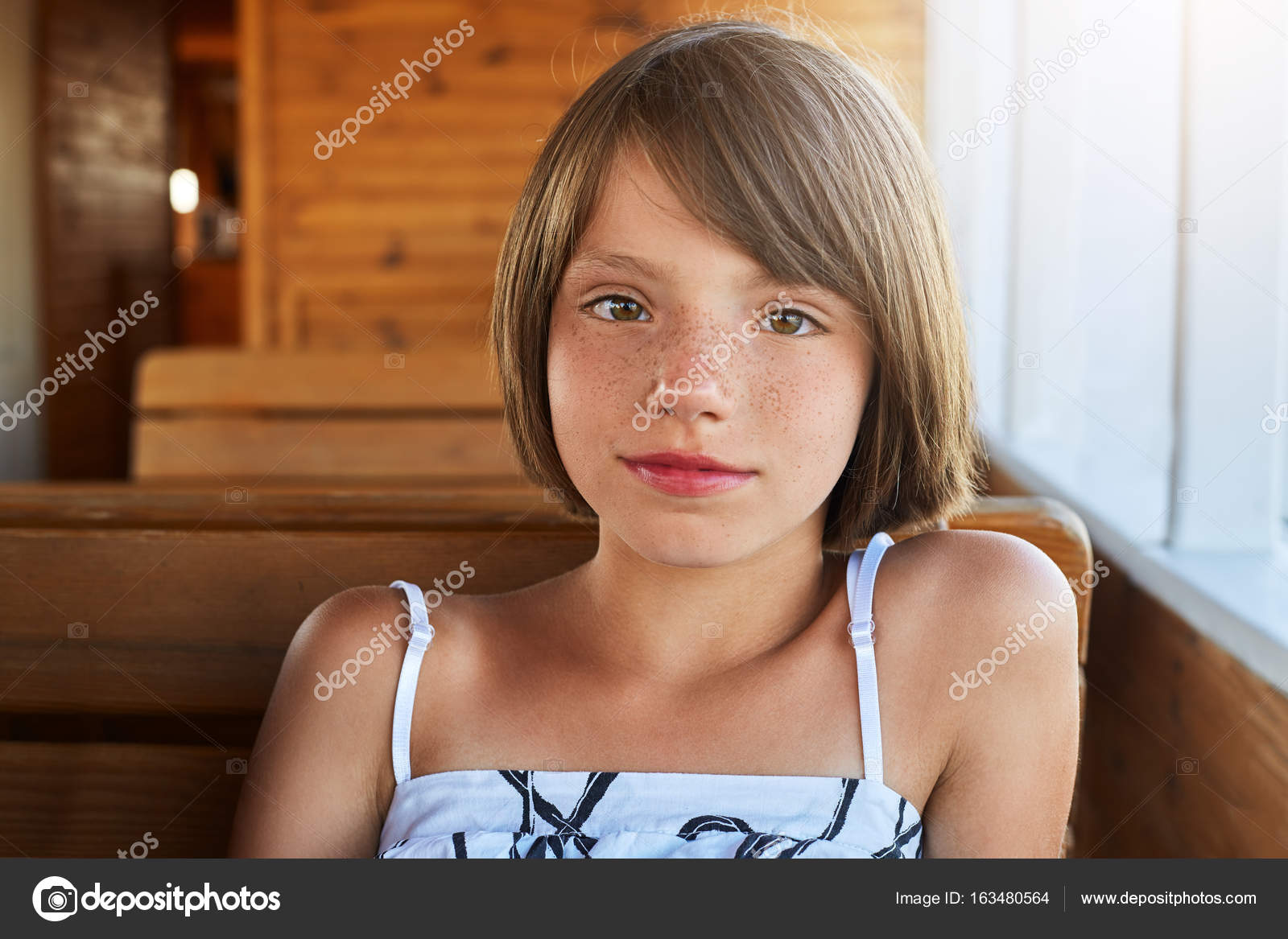 Children, rest, relaxation Pleasant-looking freckled girl