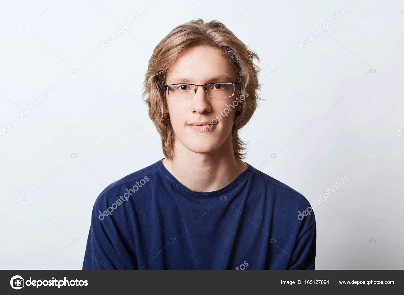 Handsome confident male with trendy hairstyle, wearing spectacles and  casual t-shirt, isolated over white background. Intelligent male student  going to university isolated over white background Stock Photo by  ©Sementsova321 165127894