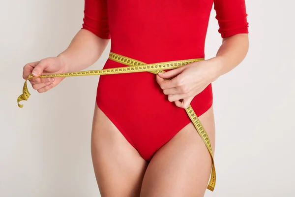 Indoor Picture Unknown Female Body Measuring Her Waist Yellow Measuring — Stock Photo, Image