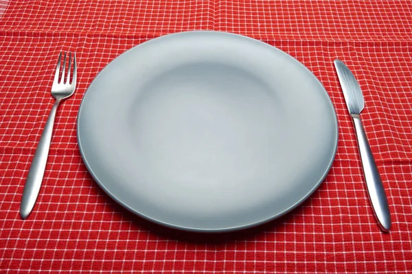 Blauer Teller und Geschirr — Stockfoto