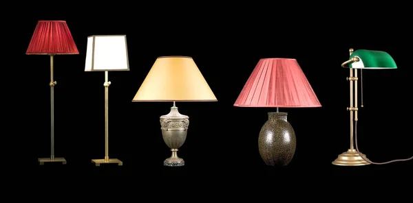 Five Decorative table lamps isolated on black background — Stock Photo, Image