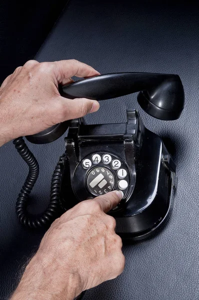 Using and dialing a vintage telephone — Stock Photo, Image