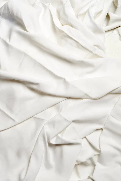 Textured white crumpled sheets — Stock Photo, Image