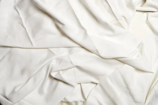 Textured white crumpled sheets — Stock Photo, Image