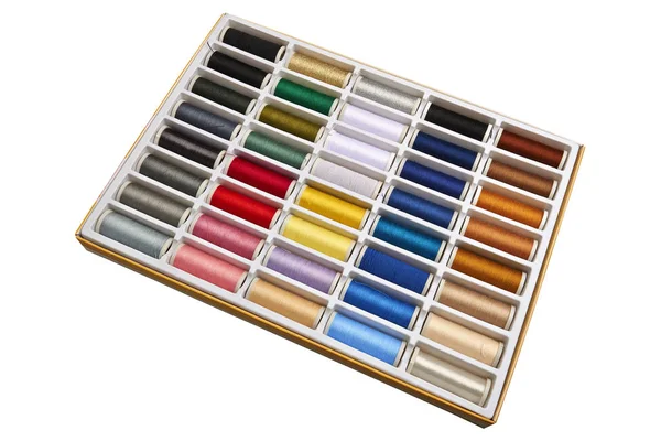 Hilos de costura multicolor fondo primer plano — Foto de Stock