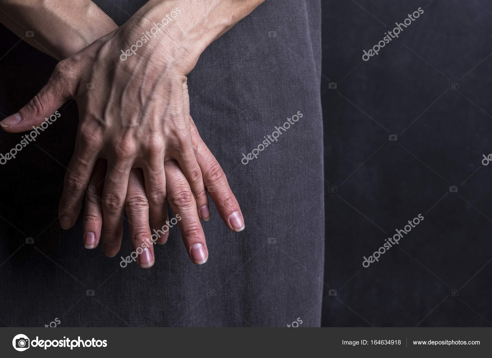 Womans hands with blood veins. Emotional gesture. Stock Photo by