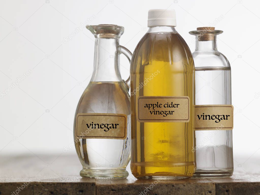 Apple cider vinegar and white vinegar