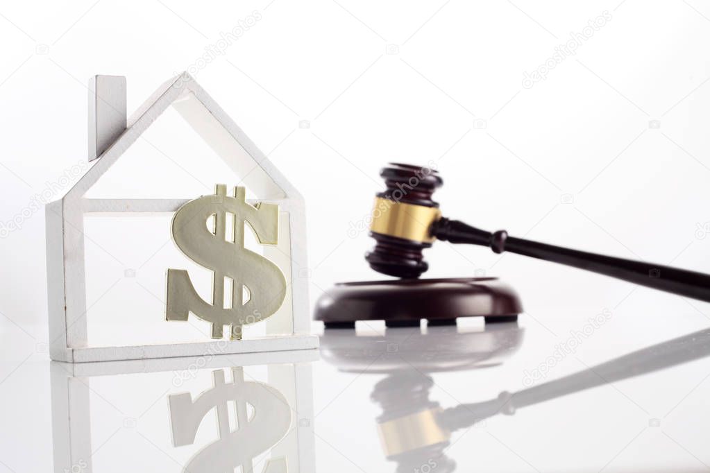 gavel with model house