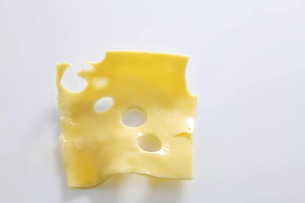 Piece of melted cheese — Stock Photo, Image