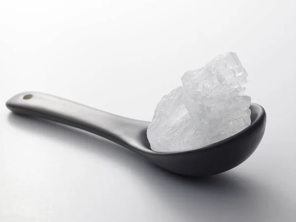Rock sugar in spoon — Stock Photo, Image