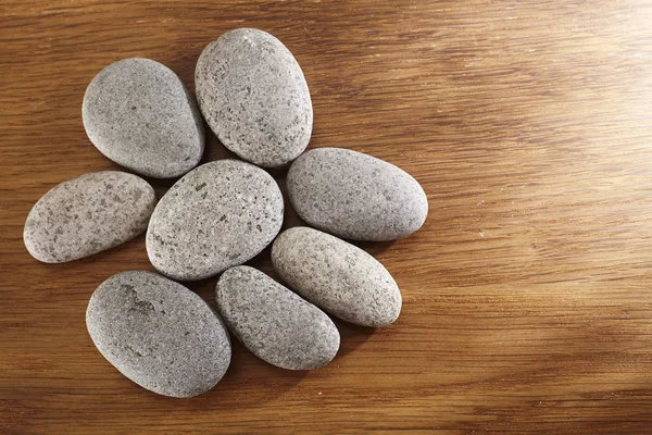 Spa stones on table — Stock Photo, Image