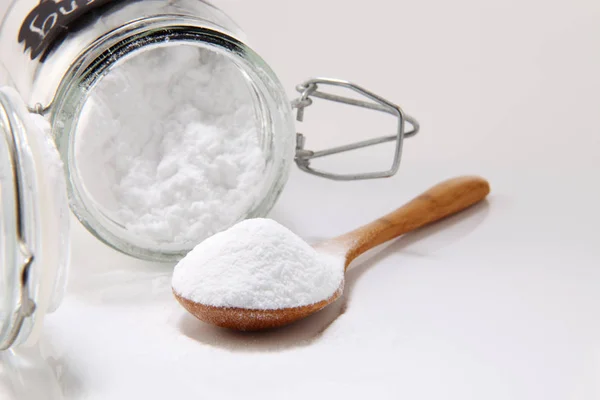 Baking soda in jar and spoon — Stok Foto