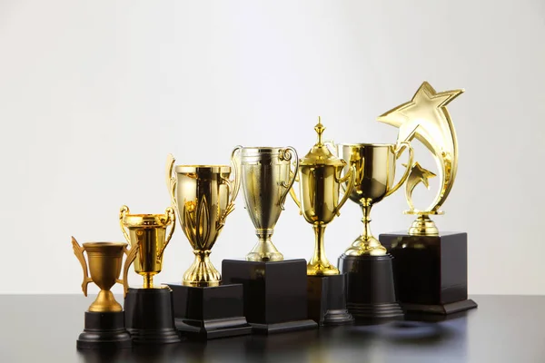 Different golden trophies — Stock Photo, Image