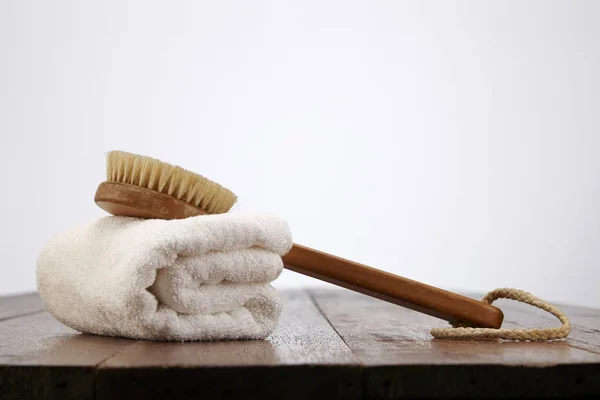 Body brush with towel — Stock Photo, Image