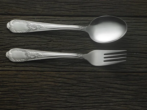 Cuchara y tenedor en la mesa — Foto de Stock