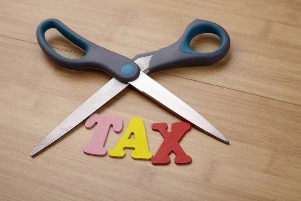 Scissors with word tax — Stock Photo, Image