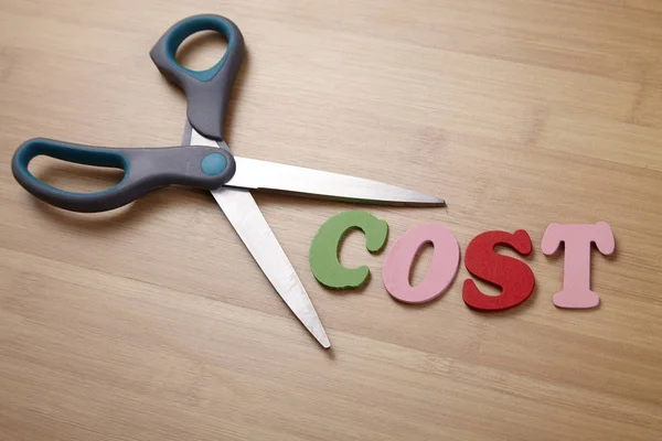 Cost concept with letters — Stock Photo, Image