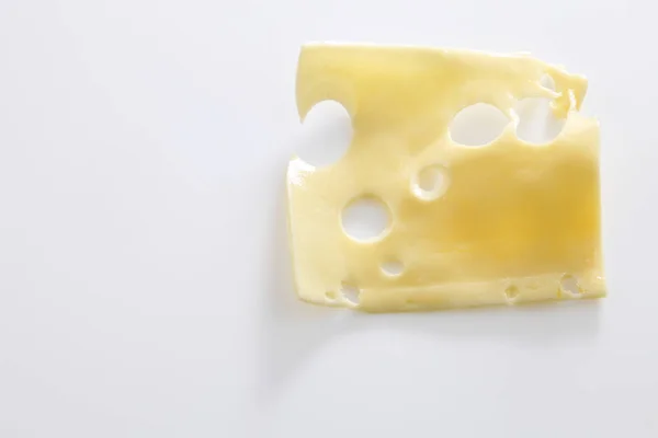 Stück geschmolzener Käse — Stockfoto