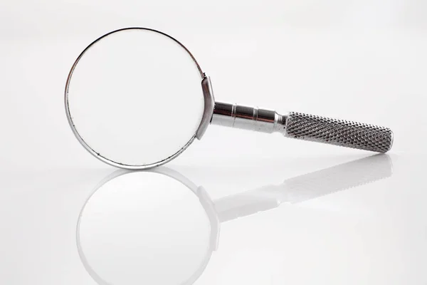 Small magnifier glass — Stock Photo, Image