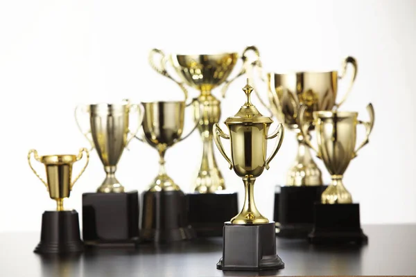 Different golden trophies — Stock Photo, Image