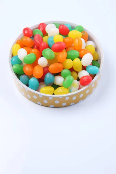 Jelly beans in container — Stockfoto