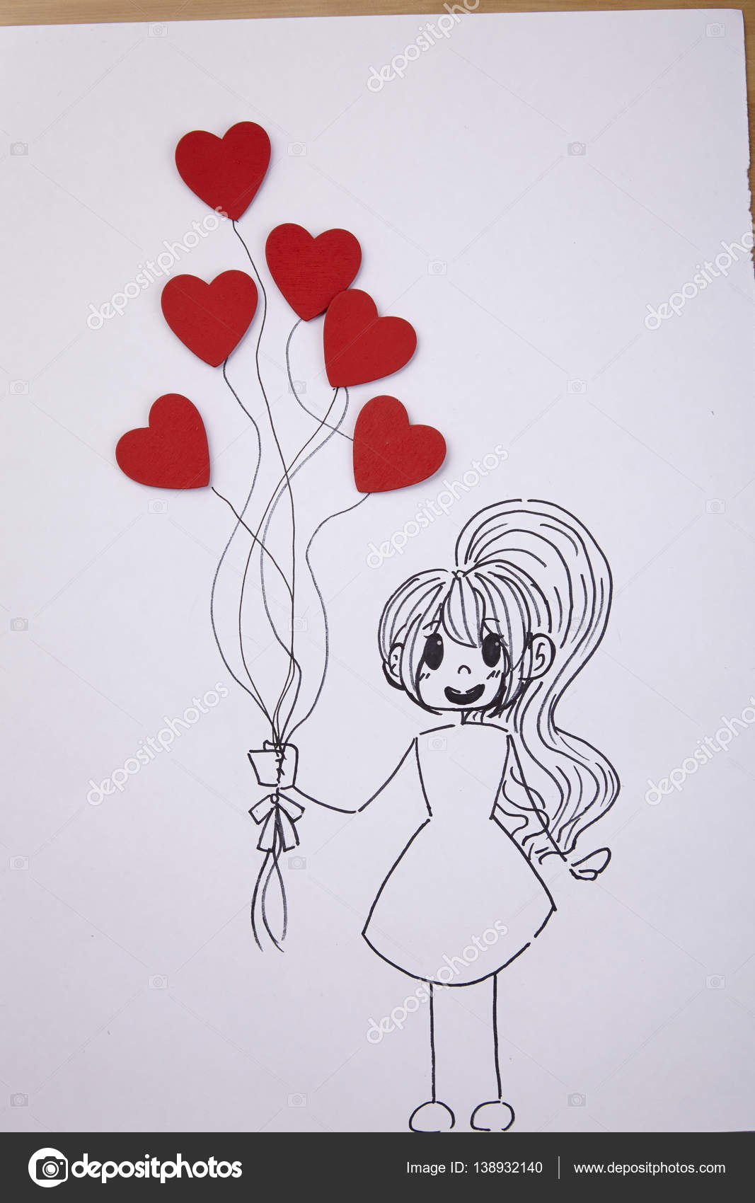 Dziewczynka Gospodarstwa Balony W Kształcie Serca Zdjęcie