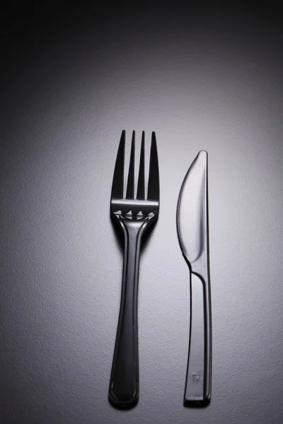 Plastic fork and knife — Stock Photo, Image