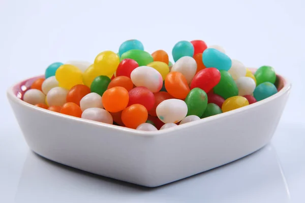 Jelly beans in container — Stock Photo, Image