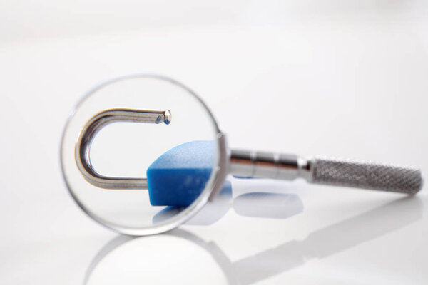 magnifier glass and padlock