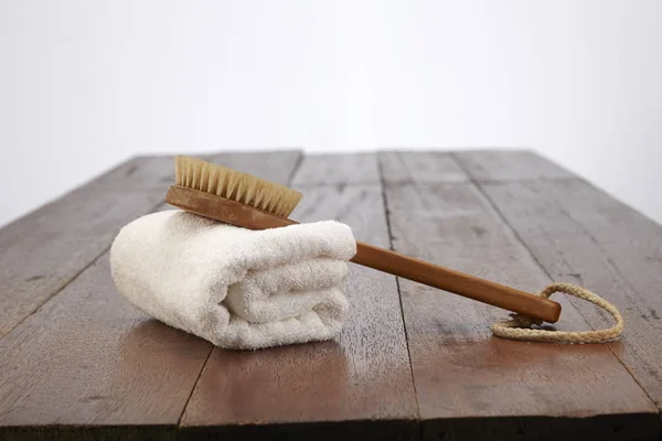 Body brush with towel — Stock Photo, Image