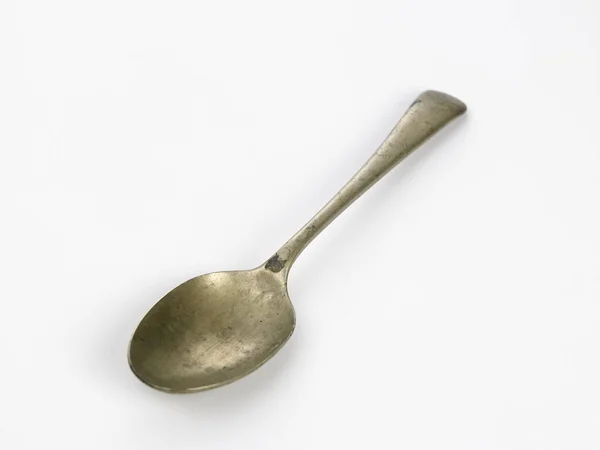 Spoon on white table — Stock Photo, Image