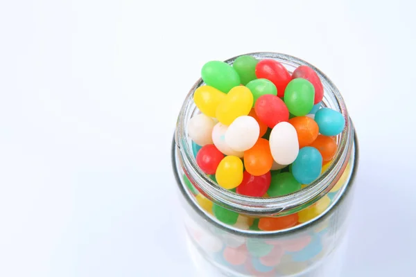 Jelly beans in jar — Stock Photo, Image