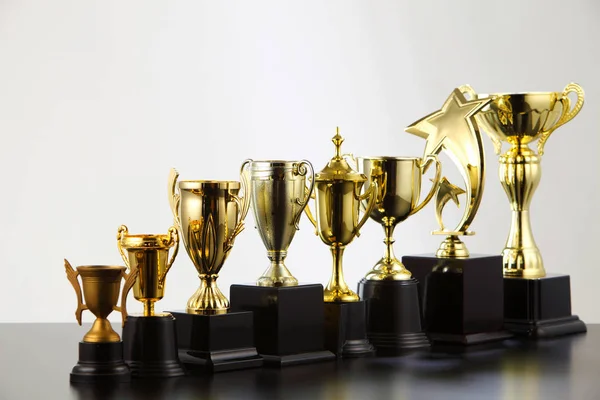 Different golden trophies — Stock Photo, Image