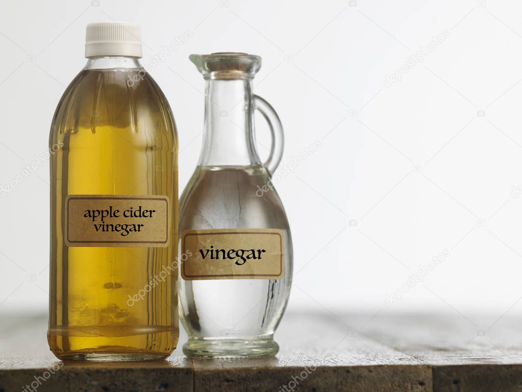 Apple cider vinegar and white vinegar